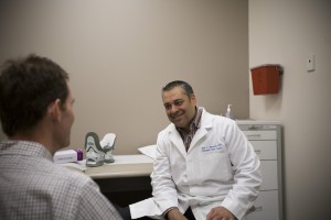 A doctor speaking with his patient