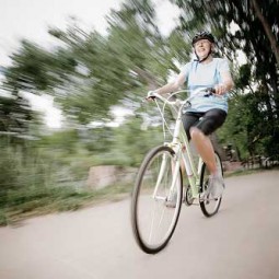 Elderly woman on bicycle