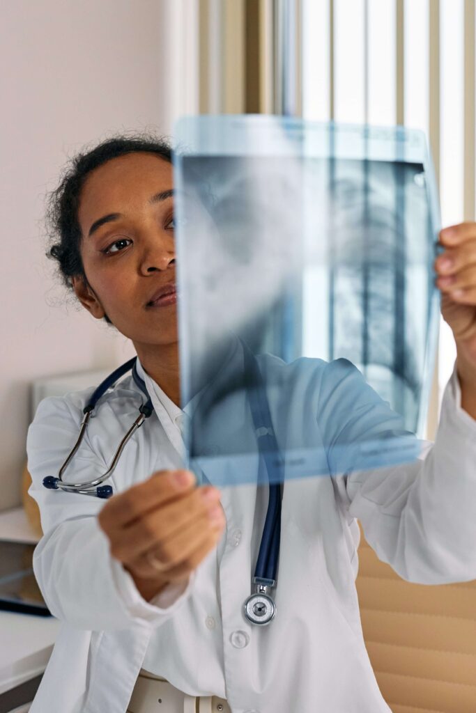 Doctor looking at spine xray