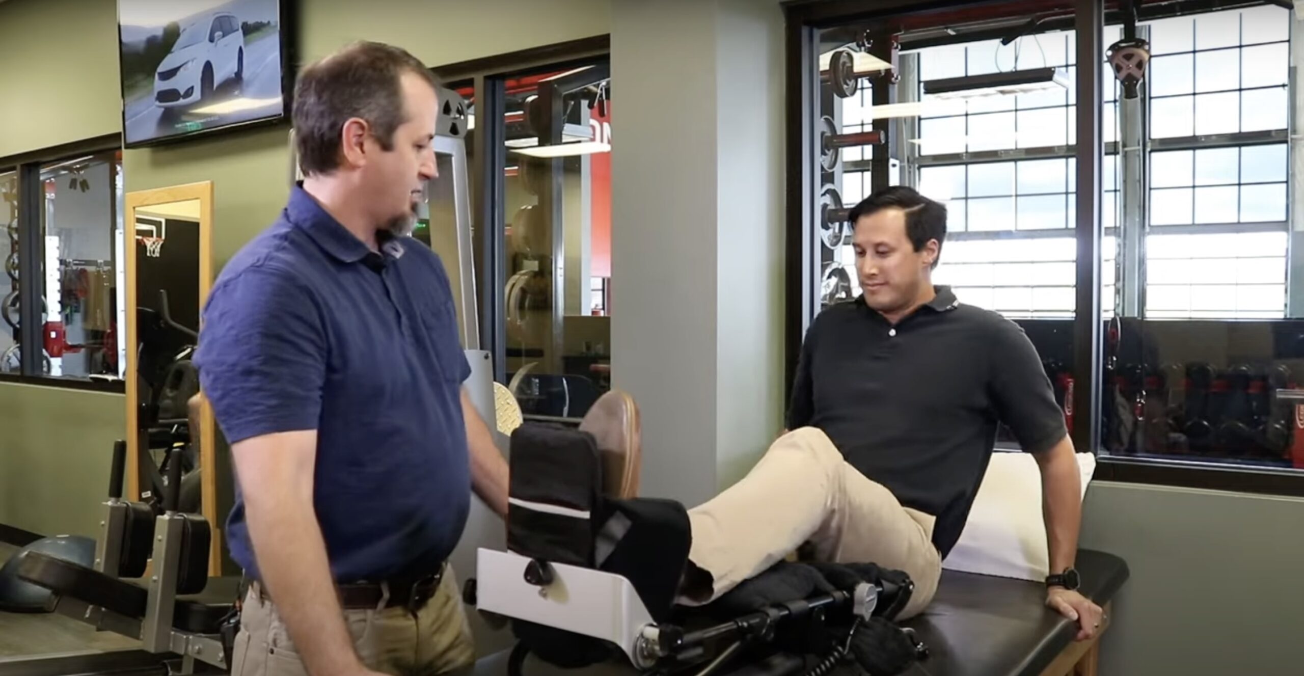 Hip 5 A physical therapist demonstrating how to use the cpm after hip surgery.